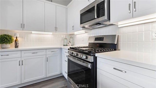 362 S Halcyon Rd, Arroyo Grande, CA 93420 - kitchen with stainless steel appliances, light countertops, white cabinets, and tasteful backsplash