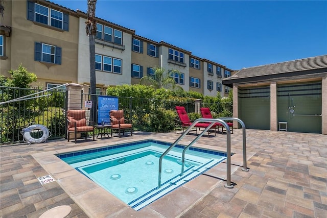 22069 Windham Way, Saugus, CA 91350 - view of pool with a community hot tub, a pool, and a patio