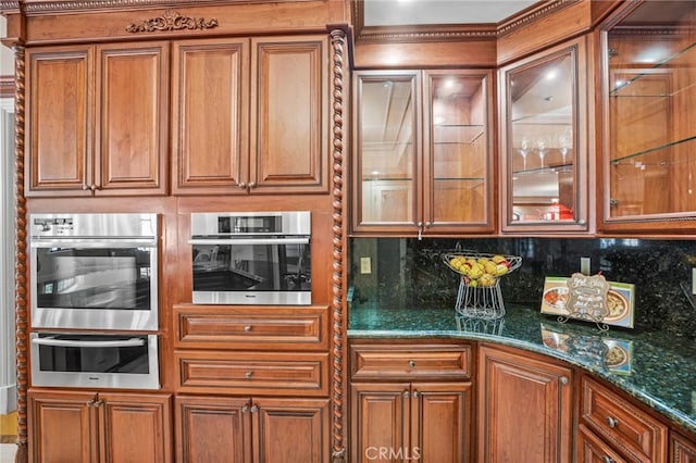 328 N Terrace View Dr, Monrovia, CA 91016 - kitchen featuring stainless steel oven, a warming drawer, glass insert cabinets, brown cabinets, and tasteful backsplash