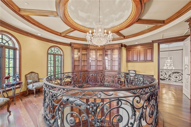 328 N Terrace View Dr, Monrovia, CA 91016 - dining room featuring a chandelier, coffered ceiling, wood-type flooring, crown molding, and baseboards