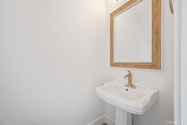 360 S Halcyon Rd, Arroyo Grande, CA 93420 - bathroom with a sink and baseboards