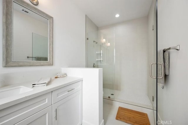 360 S Halcyon Rd, Arroyo Grande, CA 93420 - bathroom featuring vanity, a shower stall, and recessed lighting