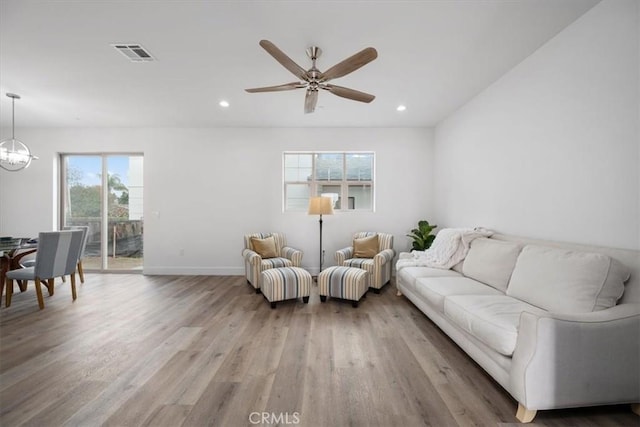 360 S Halcyon Rd, Arroyo Grande, CA 93420 - living room with wood finished floors, recessed lighting, a chandelier, and a ceiling fan