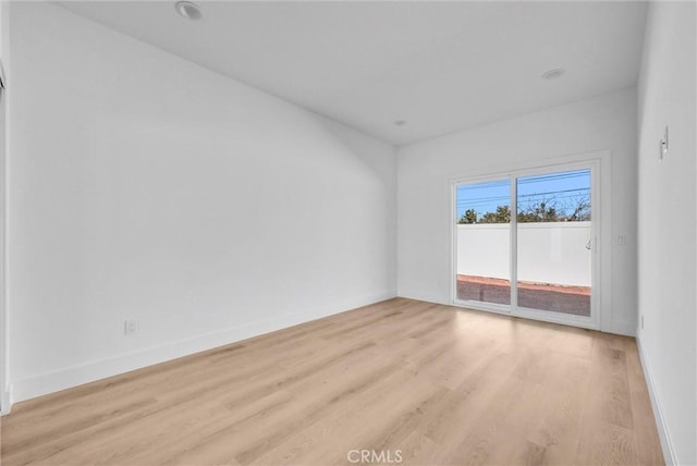 16938 Bell Ave, Lake Elsinore, CA 92530 - unfurnished room with light wood-type flooring and baseboards