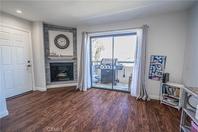 18111 Erik Ct Unit 445, Canyon Country, CA 91387 - living room with a large fireplace, wood finished floors, baseboards, and recessed lighting