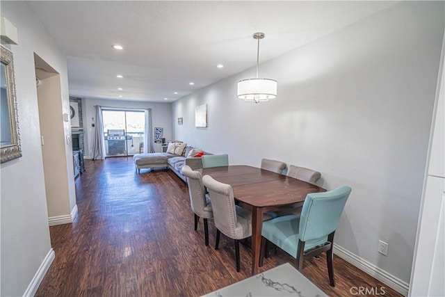 18111 Erik Ct Unit 445, Canyon Country, CA 91387 - dining area featuring wood finished floors, baseboards, recessed lighting, and a fireplace