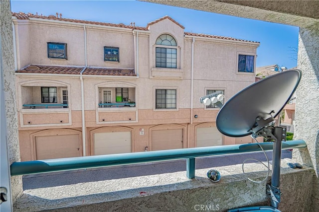 18111 Erik Ct Unit 445, Canyon Country, CA 91387 - view of front facade with stucco siding and a tile roof