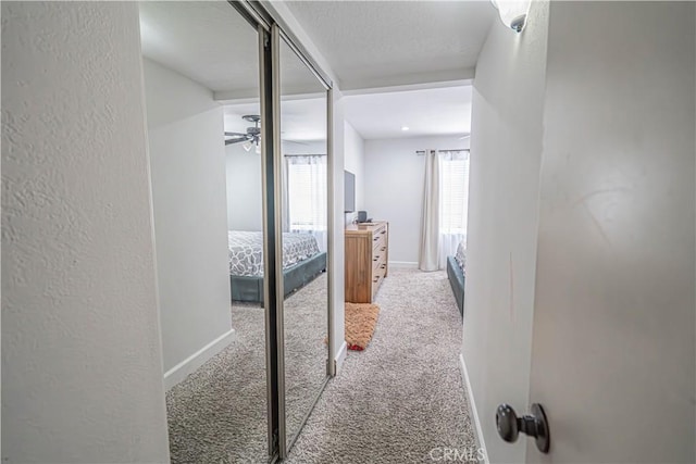 18111 Erik Ct Unit 445, Canyon Country, CA 91387 - corridor with carpet and baseboards