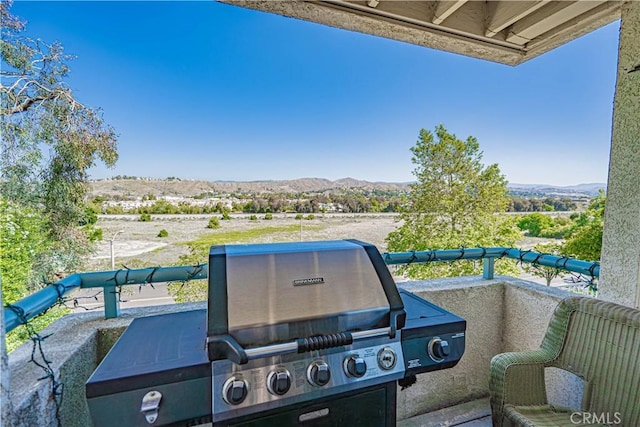 18111 Erik Ct Unit 445, Canyon Country, CA 91387 - view of patio / terrace with a mountain view, a balcony, and area for grilling