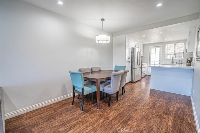 18111 Erik Ct Unit 445, Canyon Country, CA 91387 - dining area with dark wood-type flooring, recessed lighting, and baseboards
