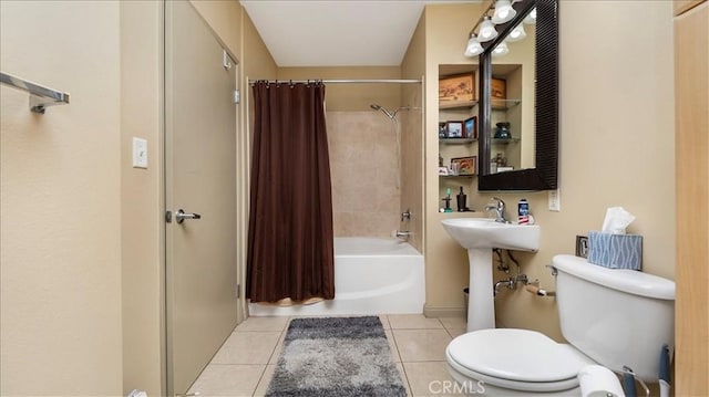 488 E Ocean Blvd Unit 708, Long Beach, CA 90802 - bathroom featuring tile patterned floors, toilet, and shower / tub combo with curtain