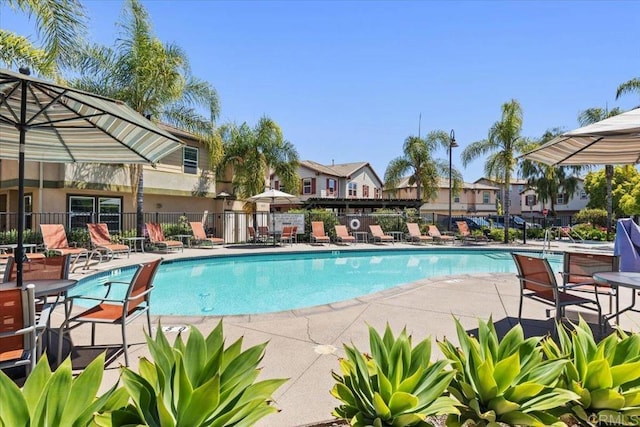 1514 Crown Ln Unit 1, Chula Vista, CA 91915 - community pool featuring a patio area and a residential view