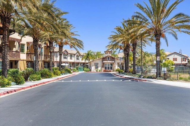 1514 Crown Ln Unit 1, Chula Vista, CA 91915 - view of asphalt road featuring sidewalks, curbs, and a residential view