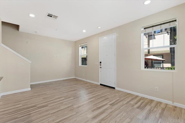 1514 Crown Ln Unit 1, Chula Vista, CA 91915 - foyer with light wood finished floors and recessed lighting