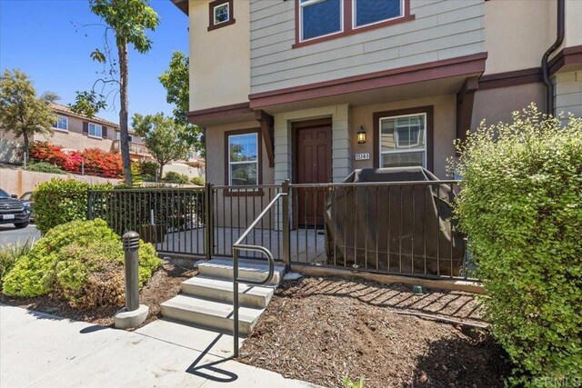 1514 Crown Ln Unit 1, Chula Vista, CA 91915 - property entrance with stucco siding and covered porch
