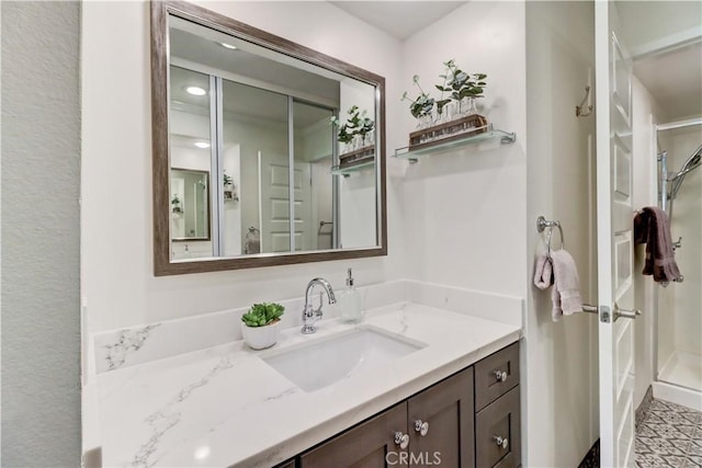 3364 Punta Alta Unit 1E, Laguna Woods, CA 92637 - full bath featuring a shower stall and vanity