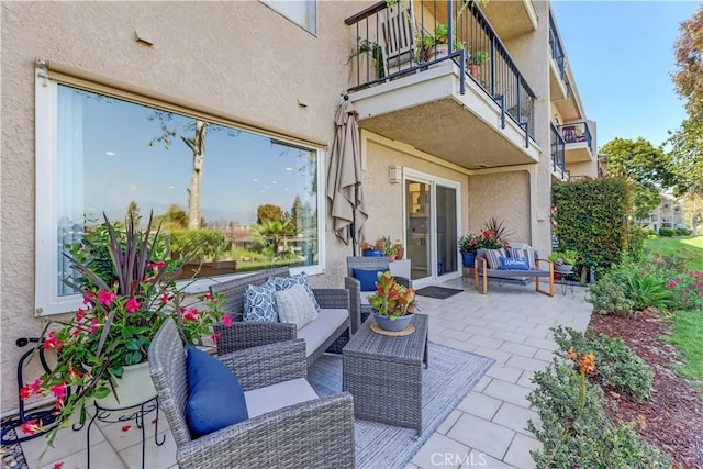 3364 Punta Alta Unit 1E, Laguna Woods, CA 92637 - view of patio / terrace with a balcony and outdoor lounge area