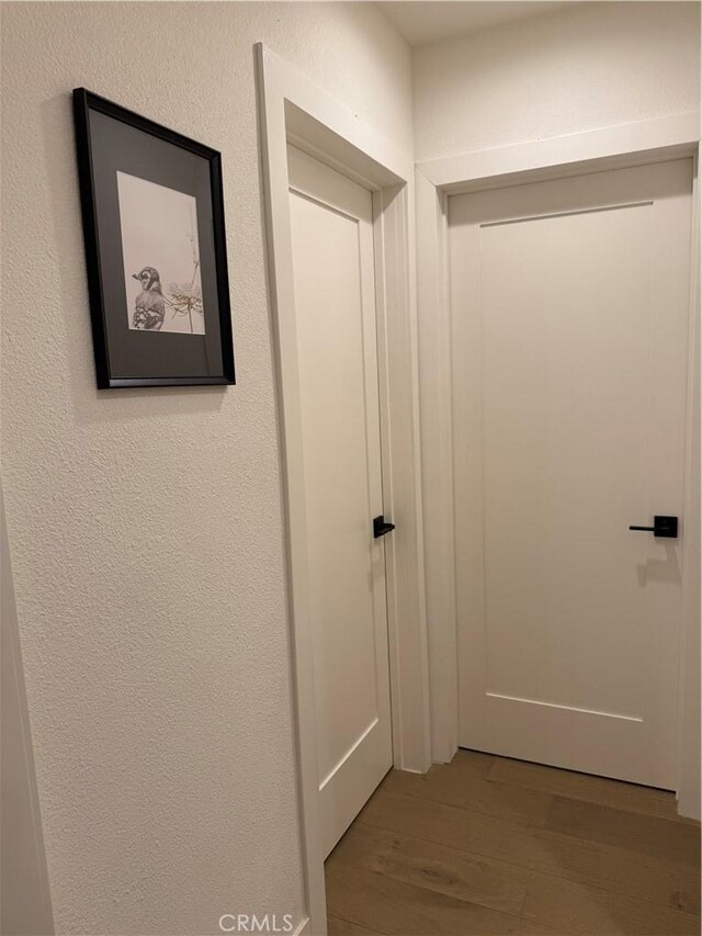 17037 Covello St, Van Nuys, CA 91406 - corridor with wood finished floors