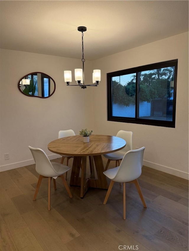 17037 Covello St, Van Nuys, CA 91406 - dining room with a chandelier and wood finished floors