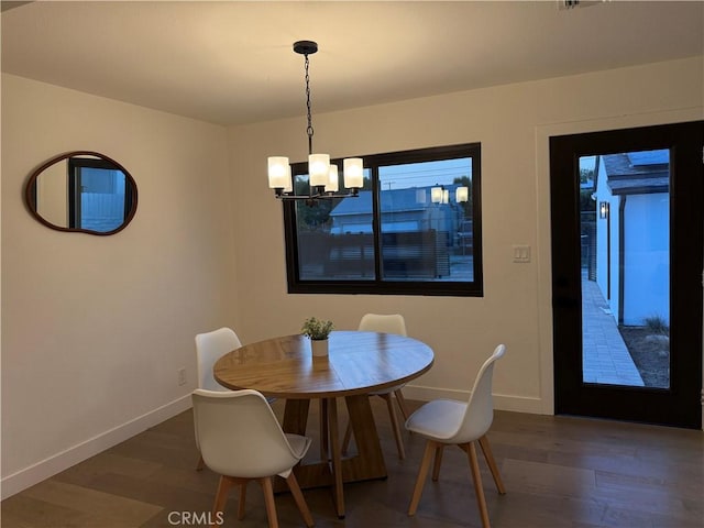 17037 Covello St, Van Nuys, CA 91406 - dining room featuring baseboards, wood finished floors, and a chandelier