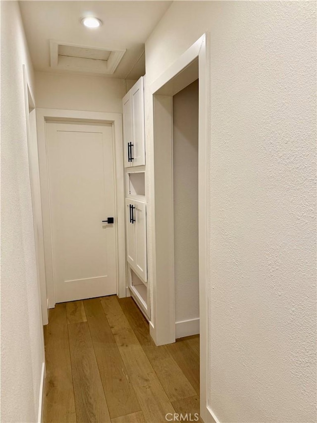 17037 Covello St, Van Nuys, CA 91406 - corridor with light wood finished floors and attic access