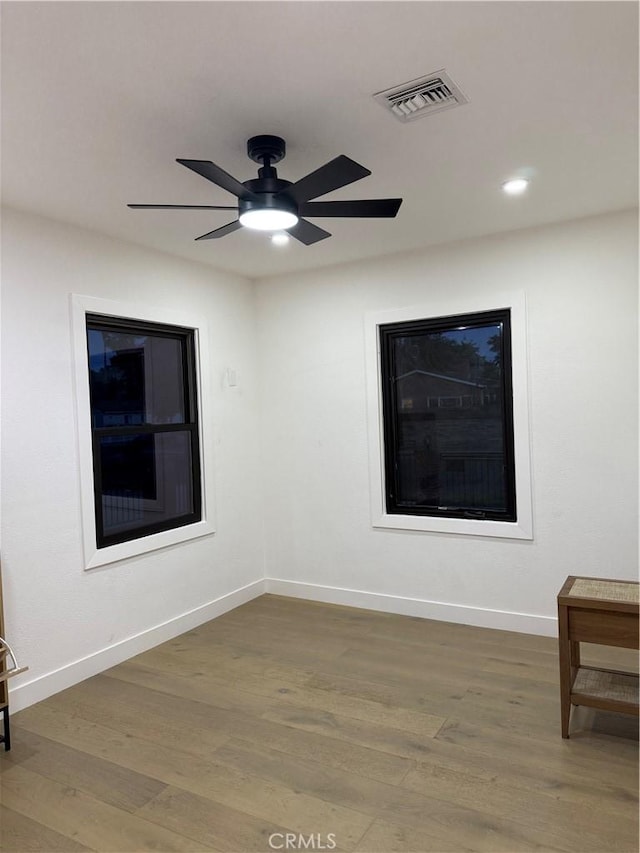 17037 Covello St, Van Nuys, CA 91406 - spare room featuring wood finished floors, ceiling fan, and recessed lighting