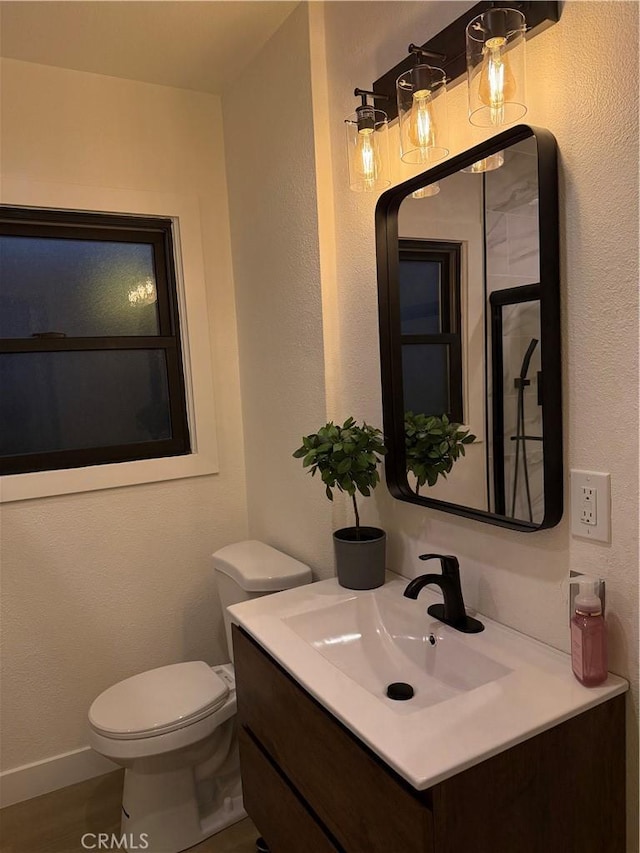 17037 Covello St, Van Nuys, CA 91406 - bathroom with vanity, toilet, and baseboards