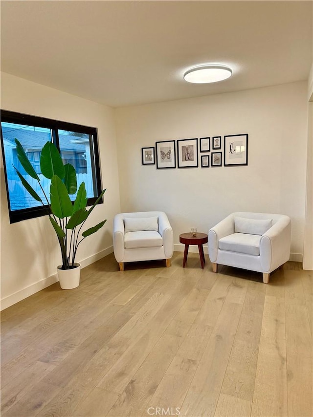 17037 Covello St, Van Nuys, CA 91406 - sitting room featuring light wood-style flooring and baseboards