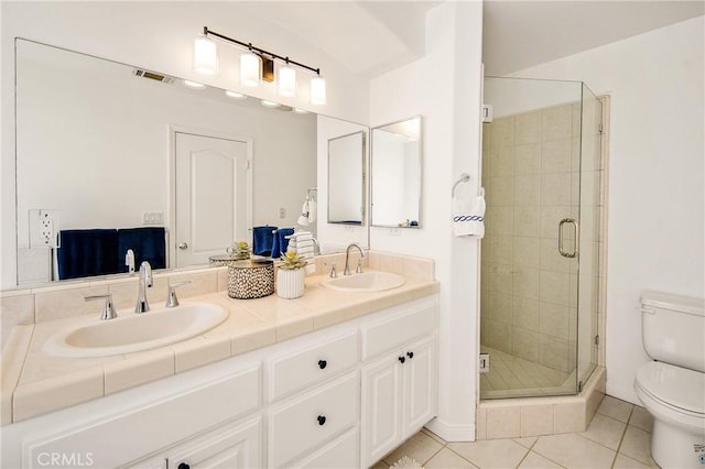 2401 Vanderbilt Ln Unit B, Redondo Beach, CA 90278 - full bath featuring toilet, tile patterned flooring, a shower stall, and double vanity