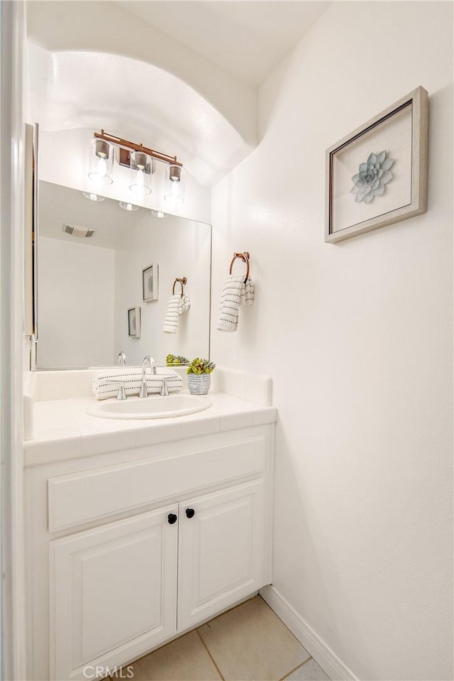 2401 Vanderbilt Ln Unit B, Redondo Beach, CA 90278 - bathroom featuring tile patterned flooring, vanity, and baseboards