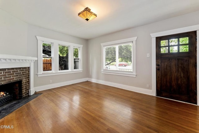 1540 Whitefield Rd, Pasadena, CA 91104 - unfurnished living room with wood finished floors, a fireplace, and baseboards