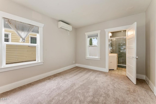 1540 Whitefield Rd, Pasadena, CA 91104 - unfurnished bedroom with a wall unit AC, carpet floors, baseboards, and connected bathroom