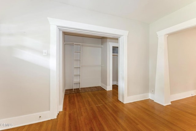 1540 Whitefield Rd, Pasadena, CA 91104 - unfurnished bedroom featuring a closet, wood finished floors, and baseboards