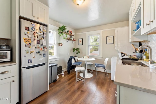 1540 Whitefield Rd, Pasadena, CA 91104 - kitchen featuring stainless steel refrigerator, a sink, tasteful backsplash, dark wood-style floors, and light countertops
