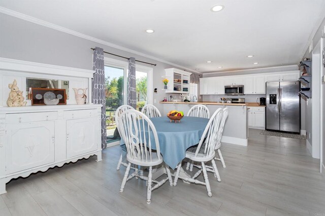 797 Trailside Pl, San Marcos, CA 92078 - dining space featuring crown molding, light wood-type flooring, and recessed lighting