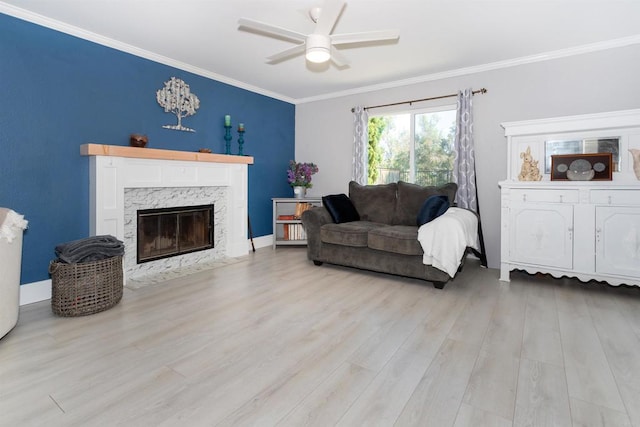797 Trailside Pl, San Marcos, CA 92078 - living room with ceiling fan, ornamental molding, light wood-style flooring, and a premium fireplace