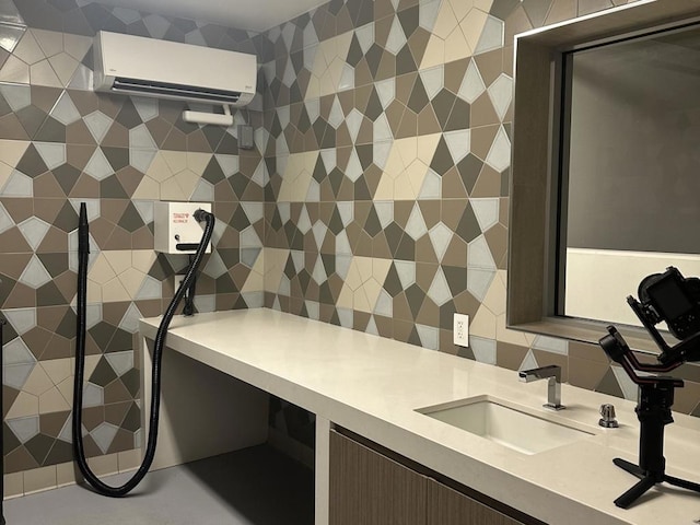 home office featuring a wall mounted AC and a sink