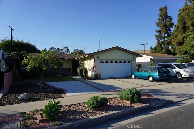 10141 Brockway St, El Monte, CA 91733 - single story home featuring a garage, driveway, and stucco siding