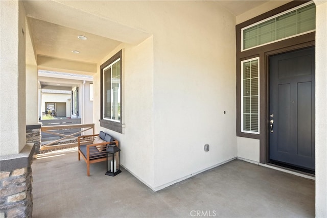 3445 Chamberlain Run, Chico, CA 95973 - view of exterior entry with stucco siding and covered porch