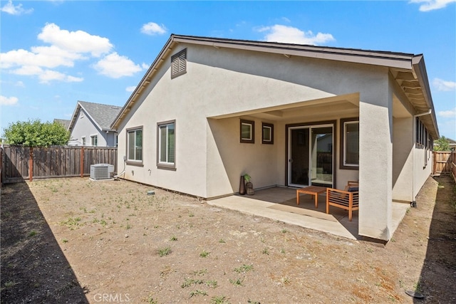 3445 Chamberlain Run, Chico, CA 95973 - back of property featuring a patio, stucco siding, and a fenced backyard