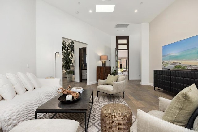 1240 Berryman Cyn, Encinitas, CA 92024 - living area with a skylight, wood finished floors, recessed lighting, and baseboards