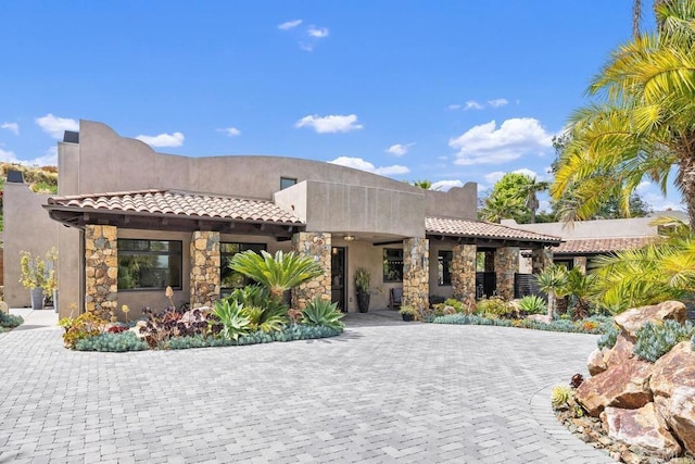 1240 Berryman Cyn, Encinitas, CA 92024 - adobe home with stone siding, a tiled roof, stucco siding, and curved driveway