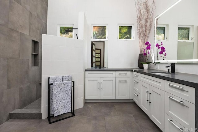 1240 Berryman Cyn, Encinitas, CA 92024 - bathroom featuring healthy amount of natural light, vanity, and walk in shower