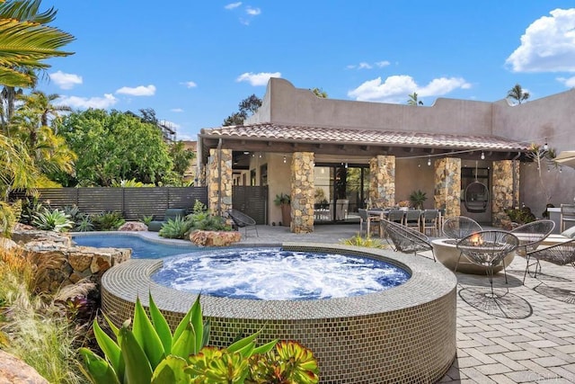 1240 Berryman Cyn, Encinitas, CA 92024 - view of patio / terrace featuring an outdoor hot tub, a fire pit, and fence