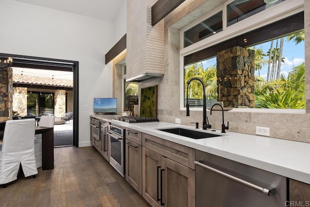 1240 Berryman Cyn, Encinitas, CA 92024 - kitchen with stainless steel appliances, a sink, light countertops, dark wood finished floors, and a towering ceiling