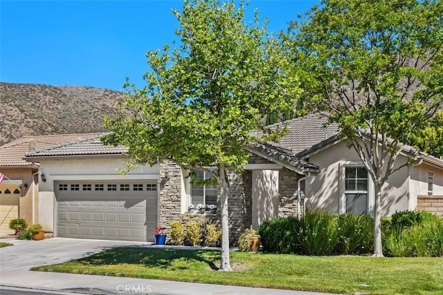 view of property hidden behind natural elements featuring an attached garage, a tile roof, stucco siding, and driveway