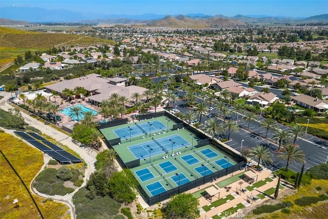 aerial view of mountains and a pool
