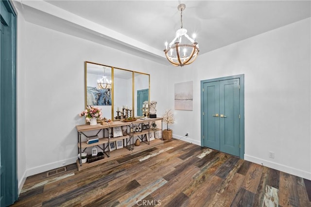 791 Cypress Rd, Lake Arrowhead, CA 92321 - dining area featuring a chandelier, wood finished floors, and baseboards