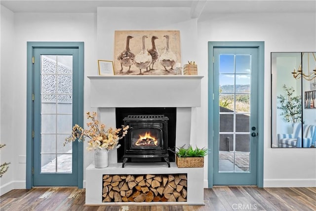 791 Cypress Rd, Cedar Glen, CA 92321 - detailed view of wood finished floors and a warm lit fireplace