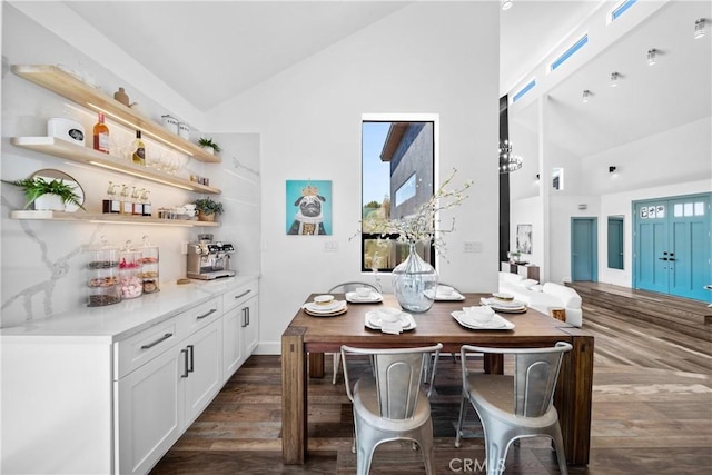 791 Cypress Rd, Cedar Glen, CA 92321 - dining area with high vaulted ceiling, dark wood-style floors, and a dry bar